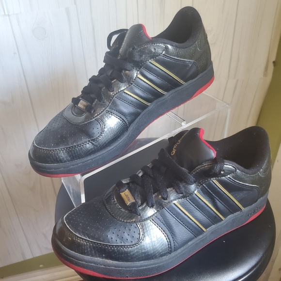adidas superstar black gold stripes